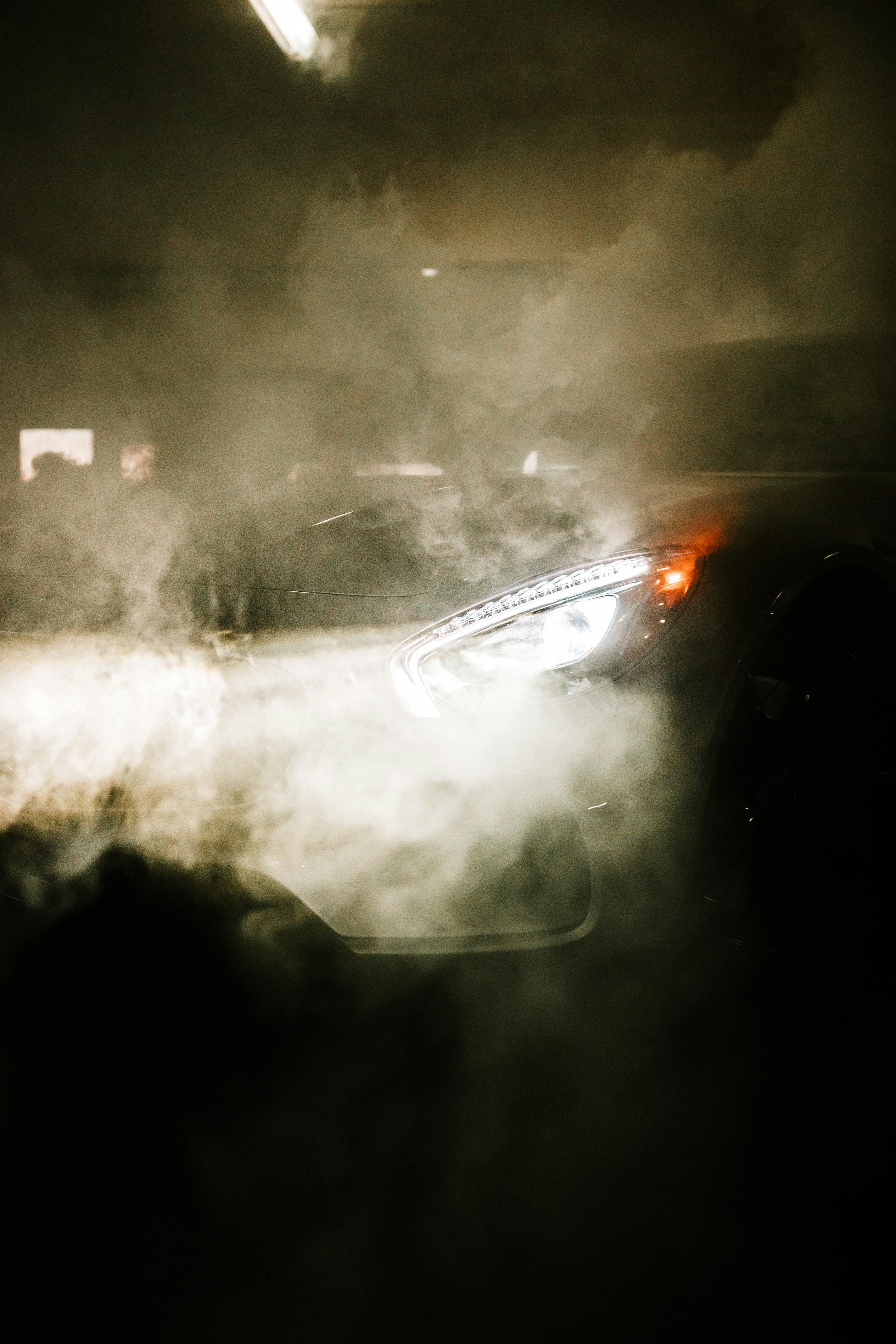 white and black car on road